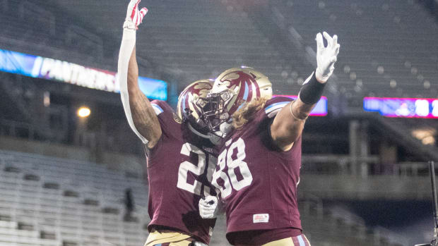 May 6, 2022; Birmingham, AL, USA; Michigan Panthers running back Stevie Scott III (25) and Michigan Panthers tight end Connor Davis (88) celebrate after Scott scored two points on a run during the second half at Protective Stadium. Mandatory Credit: Vasha Hunt-USA TODAY Sports  